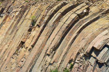 Hong Kong Global Geopark Hong Kong, Çin'de volkanik kökenli bükülmüş altıgen sütunlar.