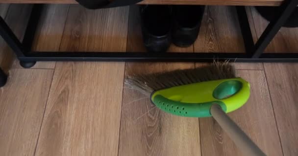 4k - Broom Cleans the room pov view . — стоковое видео