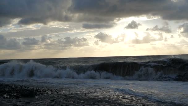 The formidable Black Sea with dashing high waves at sunset in summer in slo-mo. — Stock Video