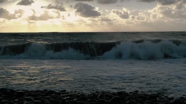 The rampant Black Sea with stormy high waves at sunset in summer in slo-mo — Stock Video