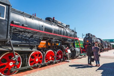 Novosibirsk, Western Siberia, Russia-April 15, 2018: the territory of the Novosibirsk Museum of railway equipment. N. A. Akulinin with retro exhibits clipart