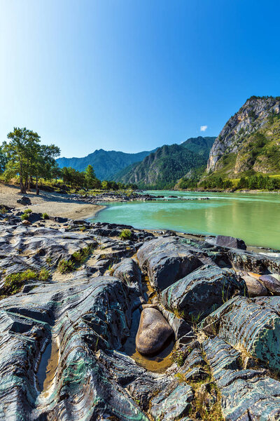 Colored stones at the Katun river. Gorny Altai, Siberia, Russia