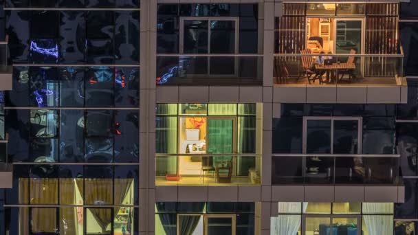 Scenic glowing windows of skyscrapers at evening timelapse — Stock Video