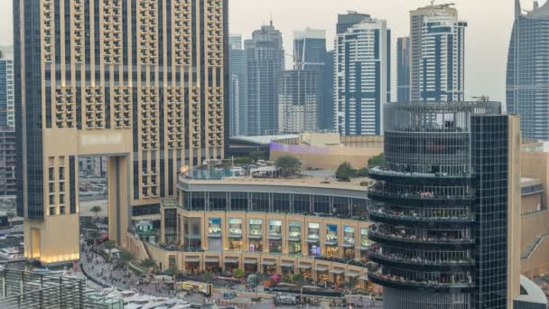 Vacker topp Flygfoto dag till natt övergång timelapse av Dubai Marina canal — Stockvideo