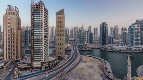 Beautiful aerial top view day to night transition timelapse of Dubai Marina canal — Stock Video