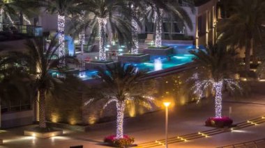 Dubai Yat Limanı gece timelapse çatıdaki yüzme havuzunda
