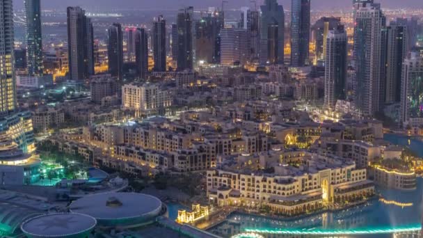 Dubai céntrico noche a día timelapse. Vista superior desde arriba — Vídeos de Stock