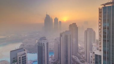 Sisli sabah gündoğumu Downtown Dubai timelapse.