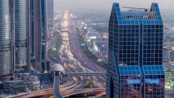 Dubai skyline centro dia a noite timelapse e Sheikh Zayed tráfego rodoviário, Emirados Árabes Unidos — Vídeo de Stock