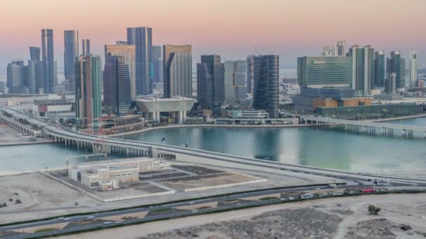 Flygfoto av Abu Dhabi centrum från ovan dag till natt timelapse — Stockvideo