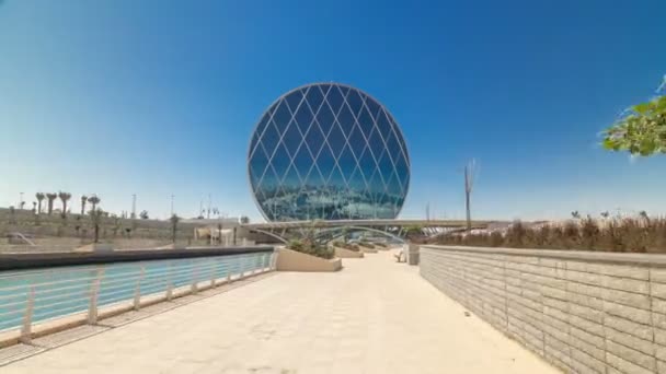 Arranha-céu circular Sede de Aldar Edifício timelapse hyperlapse em Abu Dhabi, Emirados Árabes Unidos. — Vídeo de Stock