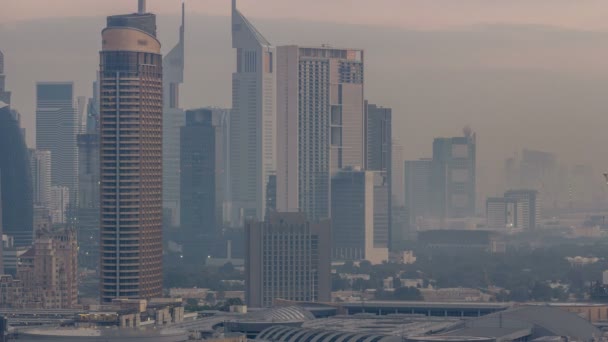 Dobai Downtown noite a dia timelapse. Vista aérea sobre grande cidade futurista à noite . — Vídeo de Stock