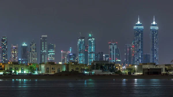 Modern Dubai City Skyline Timelapse Night Illuminated Skyscrapers Water Surface — Stock Photo, Image