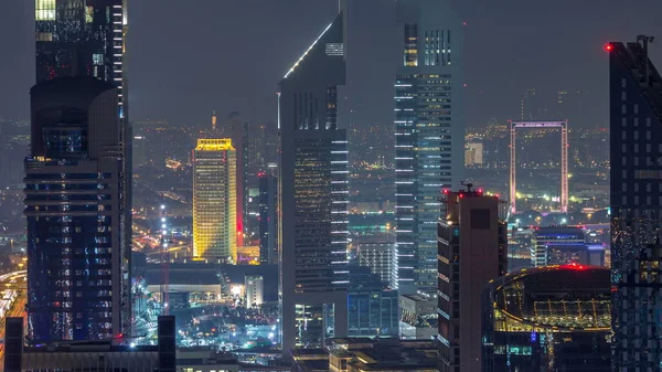 商业商业区在一个夏日的夜晚 Timelapse 现代照明摩天大楼空中俯视 阿联酋迪拜 — 图库照片