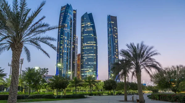 Abu Dhabi Megvilágított Etihad Tornyok Épületek Nap Éjjel Átmenet Timelapse — Stock Fotó
