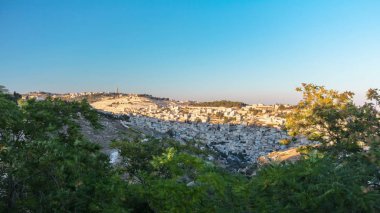 Eski Kudüs şehri timelapse. Müslüman Mahallesi, Batı Şeria. Üstten görünüm gün batımında. Gölge kapak hill ile eski binalar