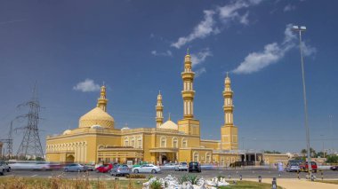 Modern Mosque Building in Kuwait timelapse hyperlapse with blue cloudy sky and green grass clipart