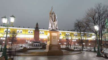 Monument to Ermogen in Alexander's garden in Moscow, popular landmark winter night timelapse hyperlapse. clipart