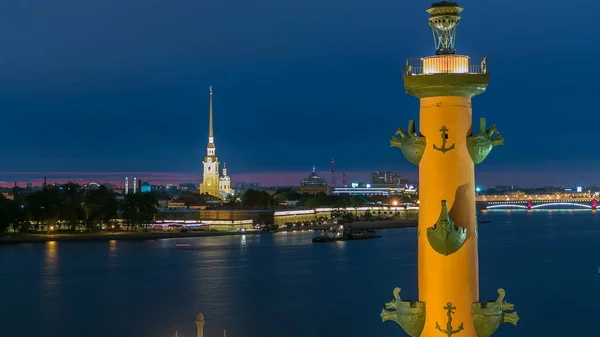 The front view of the top of the rostral column, Peter and Paul Cathedral and the Neva timelapse - the main attractions of the city. Top view from roof. Saint-Petersburg, Russia