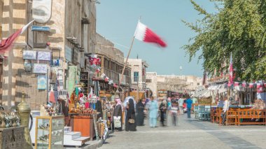 Souq Waqif timelapse. It is popular marketplace in Doha, Qatar. The souq is noted for selling traditional garments, spices, handicrafts, and souvenirs. clipart