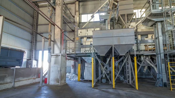 Electrical mill machinery and elevator for the production of seeds timelapse hyperlapse. Grain equipment. Factory inside