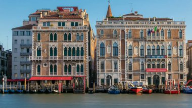 Palazzo Giustinian on the Grand Canal timelapse, Venice, Italy. Early morning after sunrise. Gondolas staying near by clipart