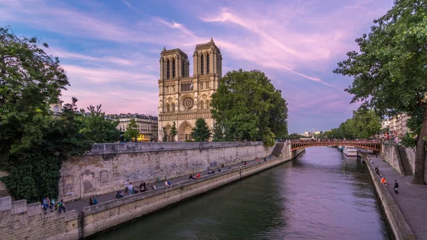 Elölnézete Megvilágított Notre Dame Paris Katedrális Nap Éjjel Átmenet Timelapse — Stock Fotó