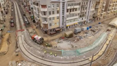 Yol bakım yapımı ile birçok işçi ve mikser timelapse için Beton işleri
