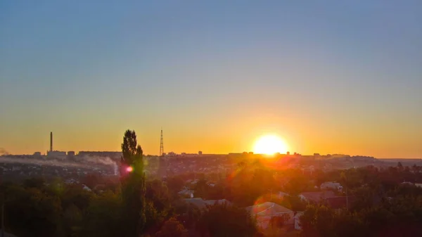 Kharkiv city from above at sunrise timelapse. Aerial view of the city center and residential districts. Ukraine.