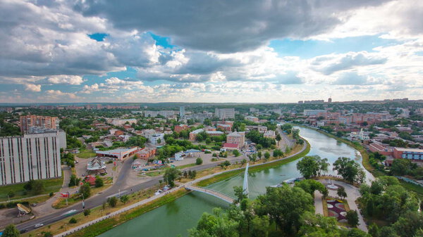 Kharkiv city from above timelapse with river and park. Aerial view of the city center and residential districts. Ukraine.