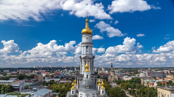 The bell tower of the Assumption Cathedral (Uspenskiy Sobor) timelapse, philharmonic organ hall aerial view in Kharkiv, Ukraine