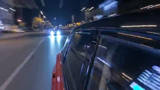 Drivelapse from side of car moving on a night avenue in city timelapse hyperlapse — Stock Video