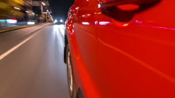 Drivelapse från sidan av bilen flyttar på en natt avenue i staden timelapse hyperlapse — Stockvideo