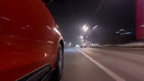 Drivelapse městské pohled z rychlé jízdy vozu na noc avenue ve městě timelapse hyperlapse — Stock video