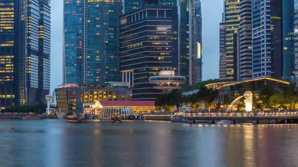 Приголомшливий вид сутінки Сінгапур міський пейзаж хмарочосів день міста до timelapse ніч — стокове відео