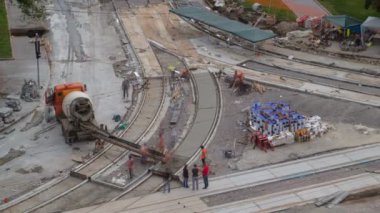 Yol bakım yapımı ile birçok işçi ve mikser timelapse için Beton işleri