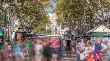 La Rambla street in Barcelona timelapse, Spain. Thousands of people walk daily by this popular pedestrian area. Crowded place clipart