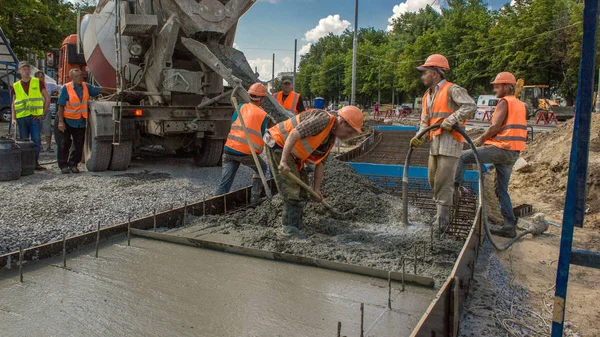 Concrete Works Road Construction Many Workers Uniform Excavators Mixer Machine — Stock Photo, Image