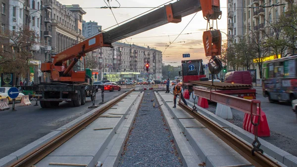 Orange Construction Telescopic Mobile Crane Unloading Tram Rails Truck Timelapse — Stock Photo, Image