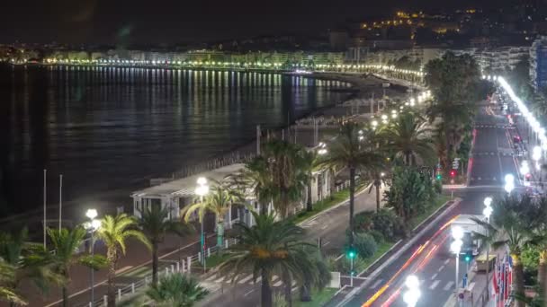 Natt antenn panorama över Nice timelapse, Frankrike. Belyst gamla stan lilla gator och waterfront — Stockvideo