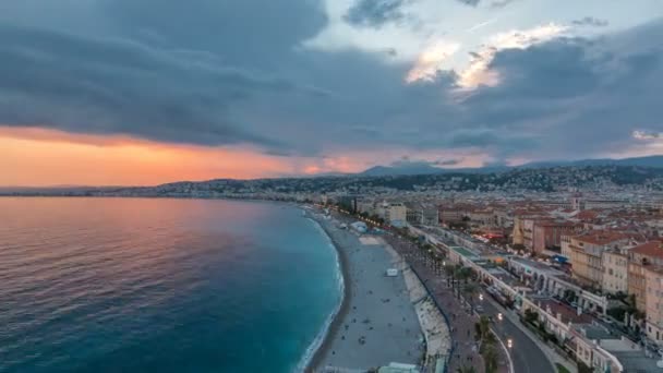 Panorama sobre la ciudad de Niza y el mar Mediterráneo día a noche timelapse — Vídeos de Stock