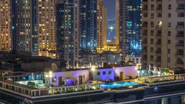 A légi felvétel a Dubai Marina-a egy pontról éjszaka timelapse. — Stock videók