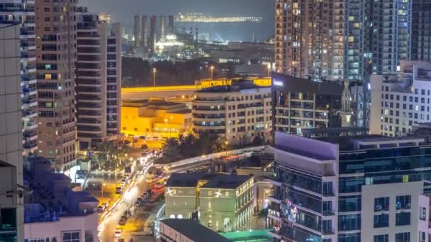 Luftaufnahme des Jachthafens von Dubai von einem Aussichtspunkt im Zeitraffer der Nacht. — Stockvideo