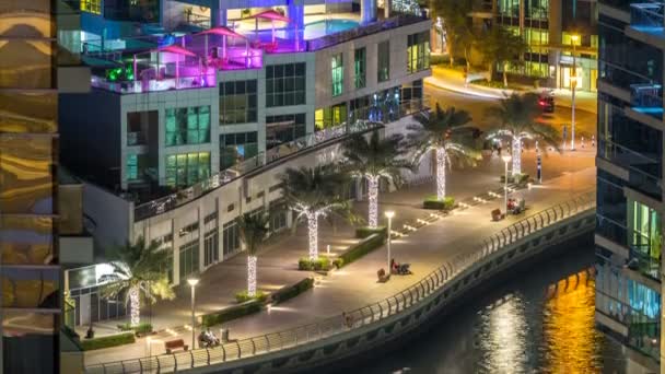 Vue aérienne du port de plaisance de Dubaï depuis un point de vue timelapse nocturne . — Video