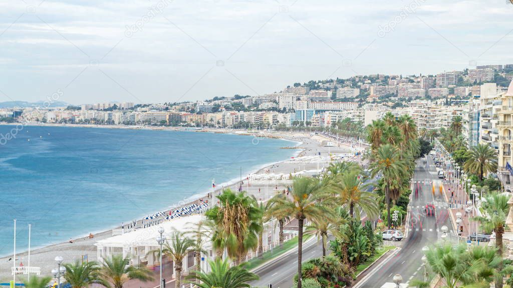 Beautiful panoramic aerial view city of Nice timelapse, France. Promenade with traffic on the road. Luxury resort of French riviera. Top view of the Mediterranean sea, bay of Angels. Cote d'Azur
