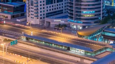 Dubai Yat Limanı gökdelenler için gün timelapse, Birleşik Arap Emirlikleri Dubai gece Jlt üzerinden doğmadan'deki hava üstten görünüm.