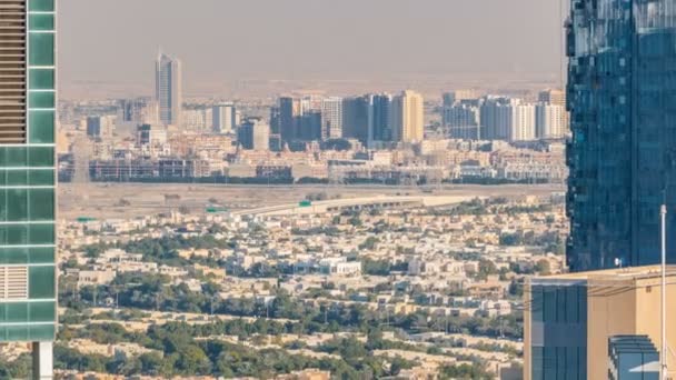 Dubai marina och Jlt skyskrapor antenn skyline under solnedgången timelapse. — Stockvideo