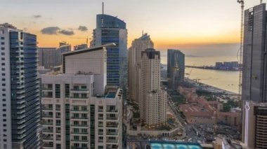 Gece timelapse günbatımı hava gün sonra JBR ve Dubai marina