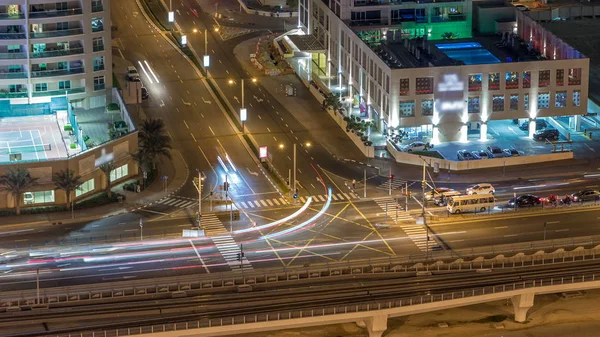 Vista Aérea Una Intersección Carreteras Gran Lapso Tiempo Nocturno Ciudad —  Fotos de Stock