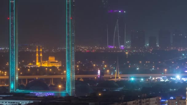 Dubai Frame with Zabeel Masjid mosque illuminated at night timelapse. — Stock Video